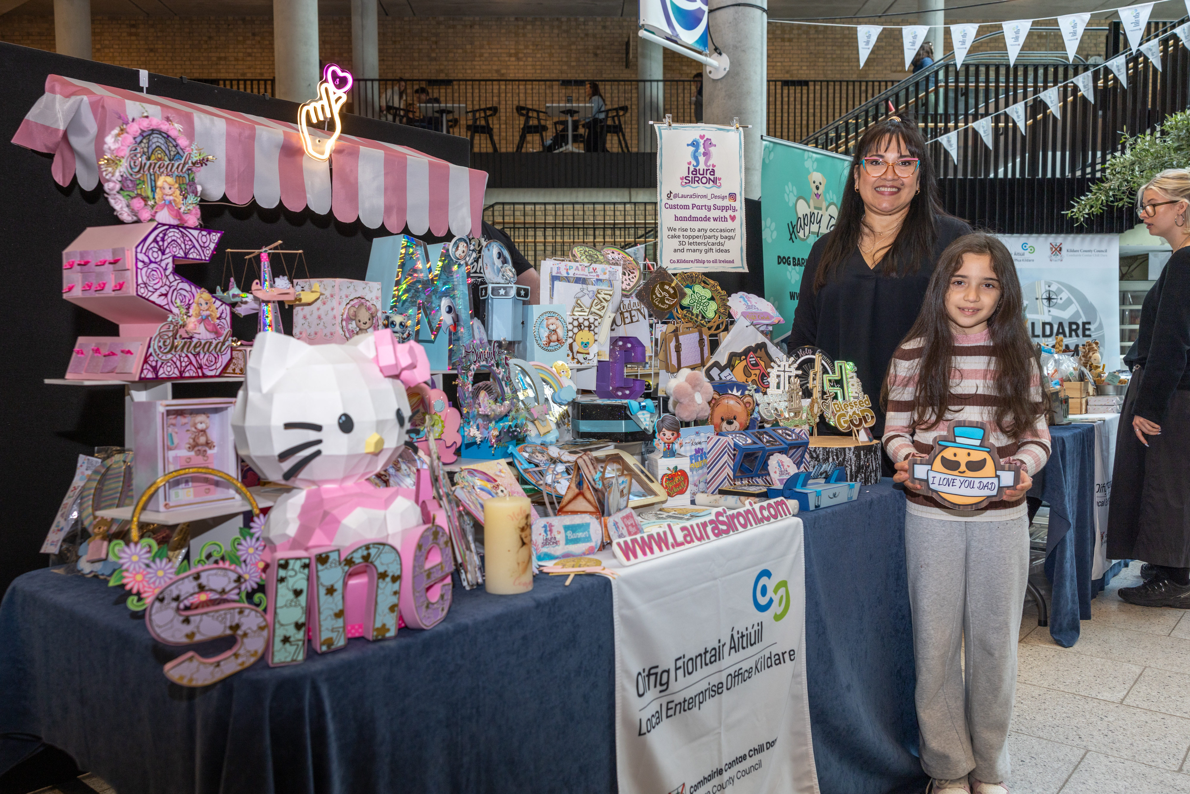 People with craft stall.